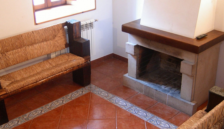 Salón con chimenea, Casa Rural Pocotrigo